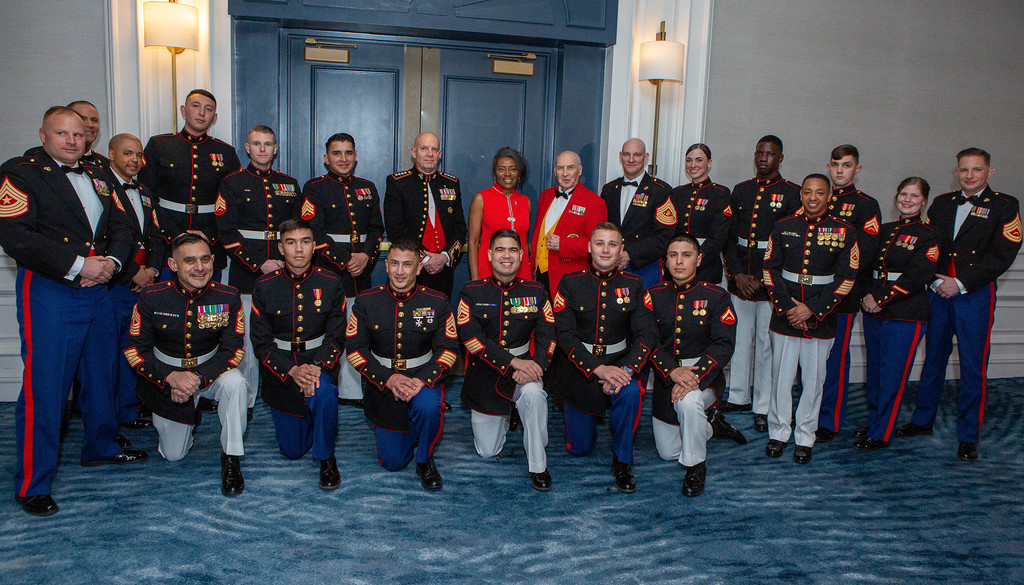 Center the 38th Commandant of the Marine Corps, Gen David H. Berger, USMC, next to him honoree Lt.Gov Winsome Earle-Sears, Mr. Lou caldera, SgtMaj of the Marine Corps. SgtMaj Troy Black