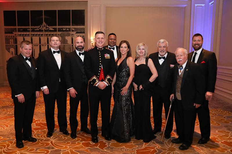 Members of Corporate Sponsor Meggitt pose with LtGen John M. Jansen, USMC.
