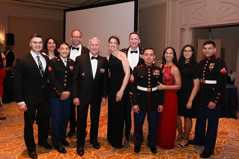 LtCol Oliver North, USMC (Ret) poses with Marines